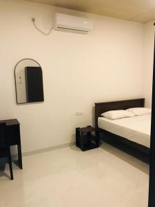 Postel nebo postele na pokoji v ubytování Green Nest Villa