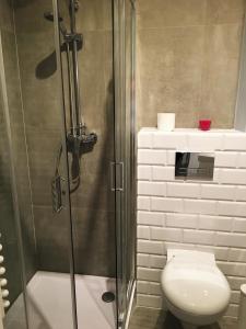 Kúpeľňa v ubytovaní Apartament blisko Centrum