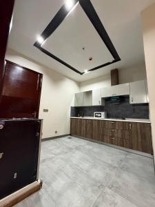 Kuchyň nebo kuchyňský kout v ubytování Luxury 2bed apartment in Islamabad Self chekin