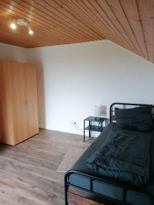 Postel nebo postele na pokoji v ubytování Wohnung am See