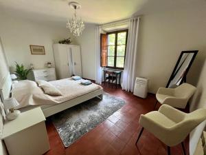 Ένα ή περισσότερα κρεβάτια σε δωμάτιο στο Apartment Sotto la Lucertola +47 φωτογραφίες