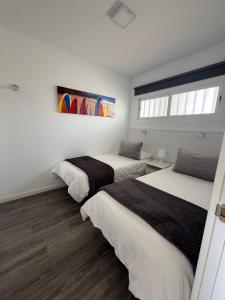 Postel nebo postele na pokoji v ubytování Solarena - Arena38 + 6 fotografií