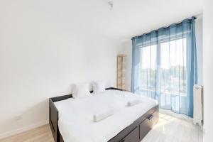 Postel nebo postele na pokoji v ubytování Family Flat for 8 # 10 min Paris # Near Airport