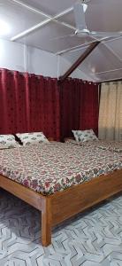 Ένα ή περισσότερα κρεβάτια σε δωμάτιο στο Rubaru Hill Resort