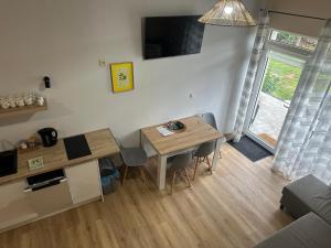 Μια τηλεόραση ή/και κέντρο ψυχαγωγίας στο Wiejski Raj- Apartamenty