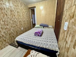 Postel nebo postele na pokoji v ubytování Mini Kitnet perfeito viajantes e executivos + 16 fotografií