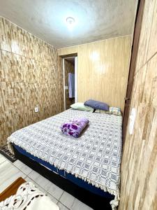 Postel nebo postele na pokoji v ubytování Mini Kitnet perfeito viajantes e executivos