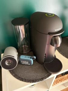 a blender sitting on top of a shelf at La Suite Trevoux in Trévoux
