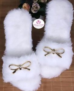 a pair of white socks with bows on them at Ethiopia in Deder