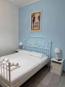 Postel nebo postele na pokoji v ubytování Le Tre Borghesi