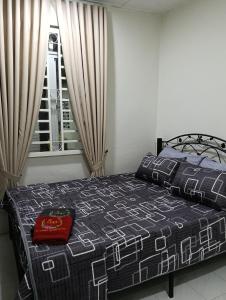 Postel nebo postele na pokoji v ubytování D'Zara Homestay D'Kedah