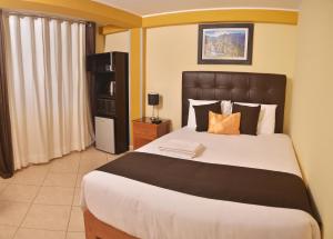 Postel nebo postele na pokoji v ubytování Hostel Esperanza