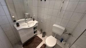 Koupelna v ubytování Ferienwohnung Kaiserblick + 14 fotografií