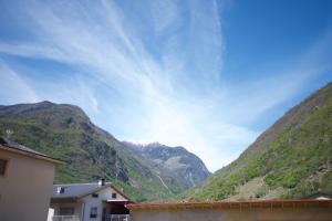 a view of a mountain range with a sky at LOFT TIRANO 3min walk to BerninaExpress in Tirano