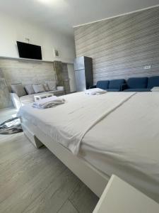 Ένα ή περισσότερα κρεβάτια σε δωμάτιο στο Marisah Residence #13