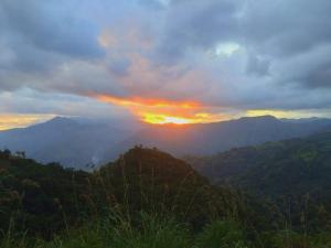 a view of a sunset from a mountain at Ella Compass in Ella