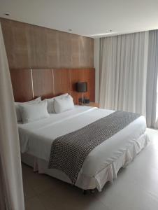 Postel nebo postele na pokoji v ubytování Hotel Nacional