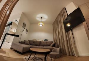 Μια τηλεόραση ή/και κέντρο ψυχαγωγίας στο Marelis City appartment Bar +8 φωτογραφίες