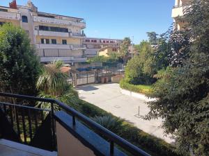 a view of a walkway in a city with buildings at Come a Casa in Caserta