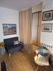 Khu vực ghế ngồi tại Come a Casa