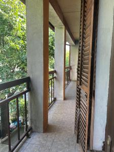 an open door to a balcony of a house at House Pravilovic apartments in Cetinje