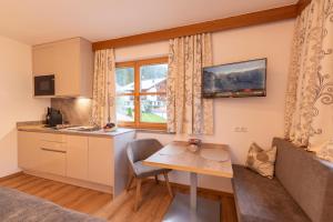 Kuchyň nebo kuchyňský kout v ubytování Valbella