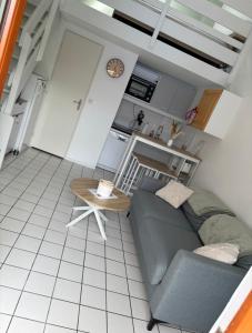 Η κουζίνα ή μικρή κουζίνα στο Maison mitoyenne dans résidence avec piscine