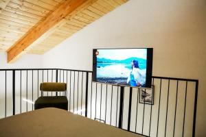 TV a/nebo společenská místnost v ubytování Vagabondo in Corte