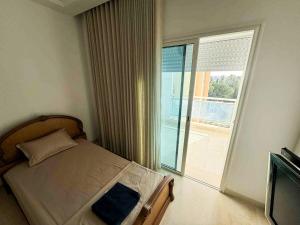 Postel nebo postele na pokoji v ubytování Luna Loft + 7 fotografií