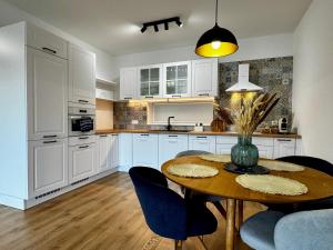 Kuchyň nebo kuchyňský kout v ubytování PROMENADA Apartments with FREE PARKING