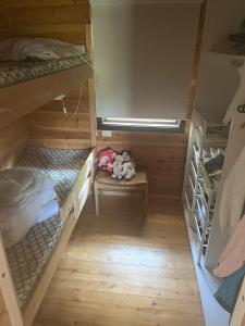 an overhead view of a room with bunk beds at Cottage by the lake in Namsos in Fosslandsosen
