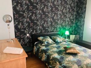 Ένα ή περισσότερα κρεβάτια σε δωμάτιο στο Appartement "vintage 70", 2 pièces, 45 m2