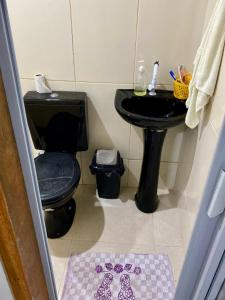 Koupelna v ubytování Casa com varanda toda mobiliada