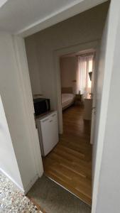 an empty room with a bedroom and a bed in a room at Venice Heart Rooms in Venice +36 photos