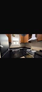 Kuchyň nebo kuchyňský kout v ubytování cozy apartment