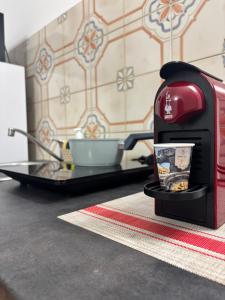 a toaster sitting on a table in a kitchen at Arusticana al 393 in Catania