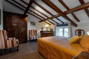 a bedroom with a large bed in a room at Villa Orange Rome in Castel di Leva +32 photos