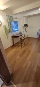 a room with a table and a laptop on a desk at bei GRETA Wohnung 77 in Marl