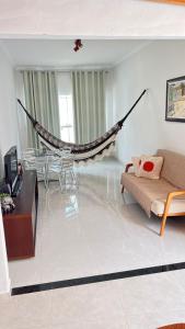 Χώρος καθιστικού στο Apartamento Aconchegante com Varanda em Pesqueira