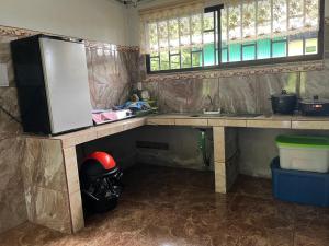 Kuchyň nebo kuchyňský kout v ubytování Hostel Cora Chia