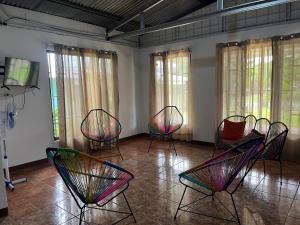 TV a/nebo společenská místnost v ubytování Hostel Cora Chia