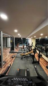 a gym with several exercise bikes in a room at Kazani Heights Luxurious apartments in Islamabad