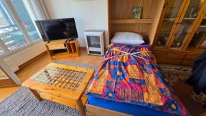 Ένα ή περισσότερα κρεβάτια σε δωμάτιο στο Appartement l Magnifique vue l Proche Crans-Montana
