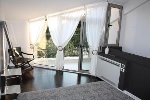Kuchyň nebo kuchyňský kout v ubytování Marinela Suites