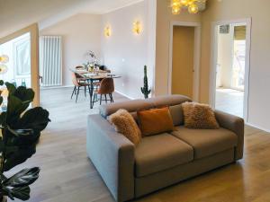 a living room with a couch and a table at mA Bellavista Deluxe in Cesena