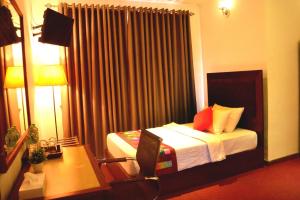 Postel nebo postele na pokoji v ubytování The Rosedale Grand Resort