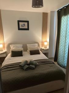 Postel nebo postele na pokoji v ubytování Les 3 anges