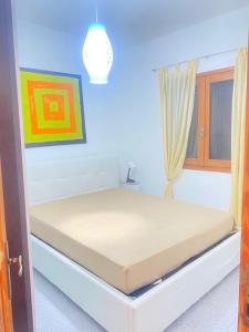 Cama o camas de una habitación en White House in Cannigione