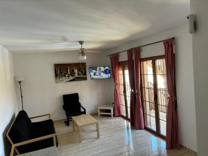 Μια τηλεόραση ή/και κέντρο ψυχαγωγίας στο Apartamento Torres
