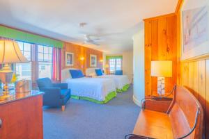 Ένα ή περισσότερα κρεβάτια σε δωμάτιο στο Winstead Beach Resort